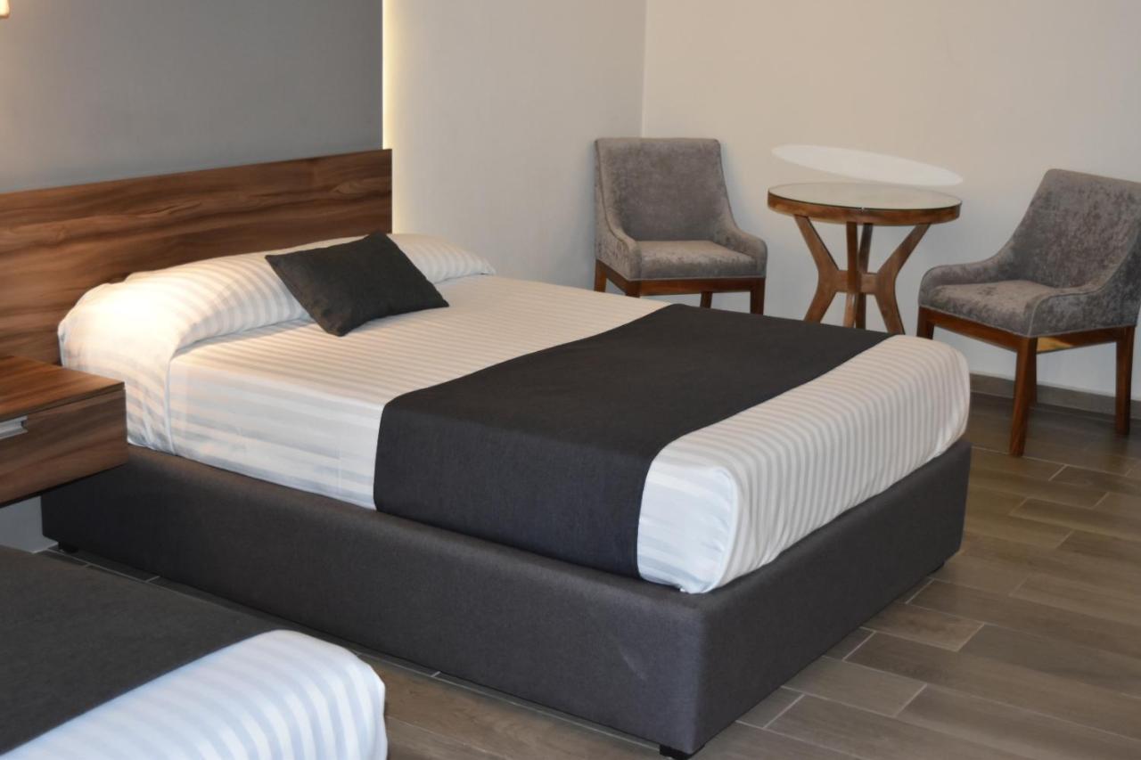 Estanza Hotel&suites