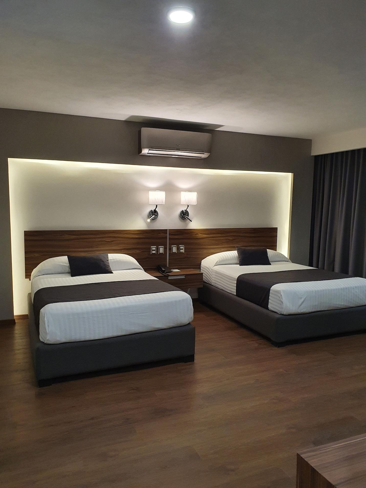 Estanza Hotel&suites