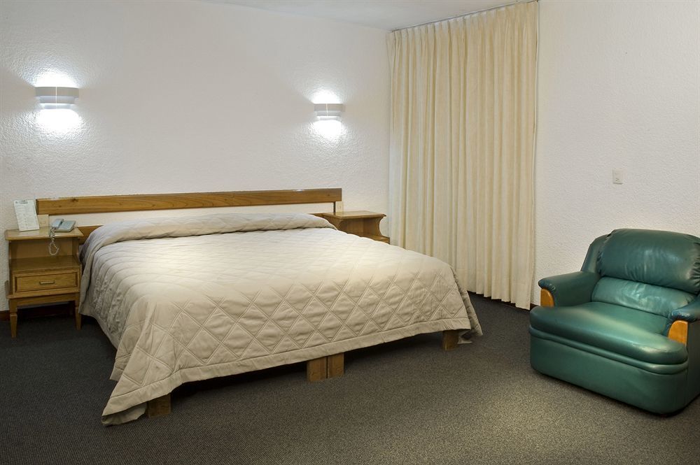 Estanza Hotel&suites Hotel