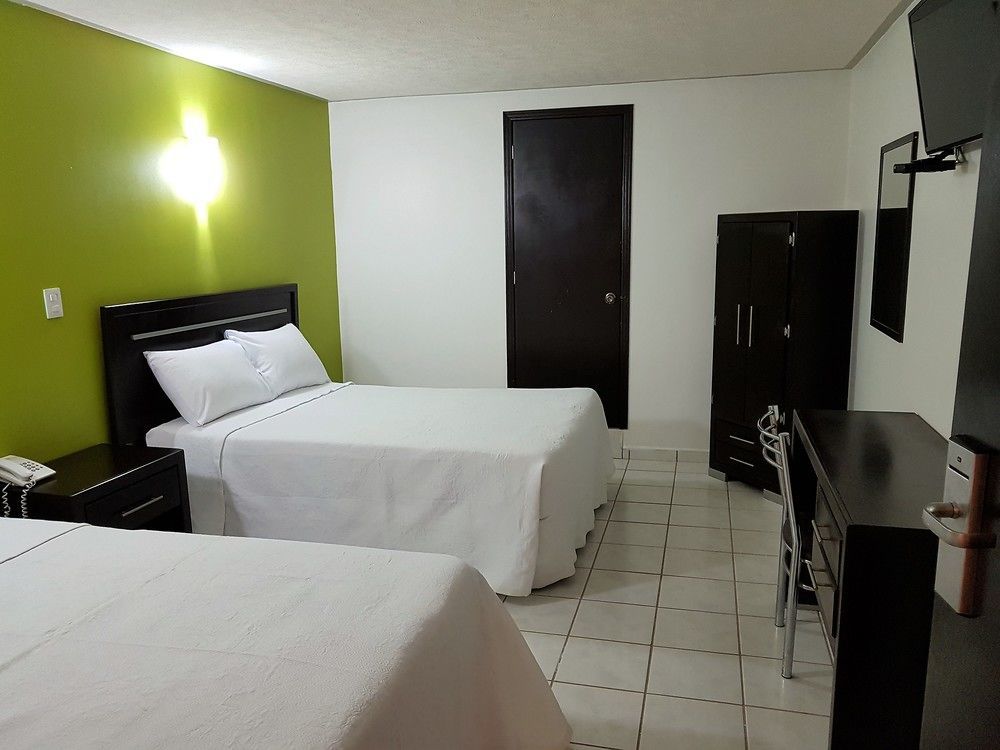 Capital O Victoria Hotel
